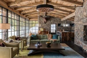 Rustic living room cozy digsdigs airy designs stump fireplace wooden tree furniture wood cabin